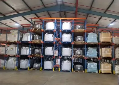Industrial racking system with large storage bags in a warehouse